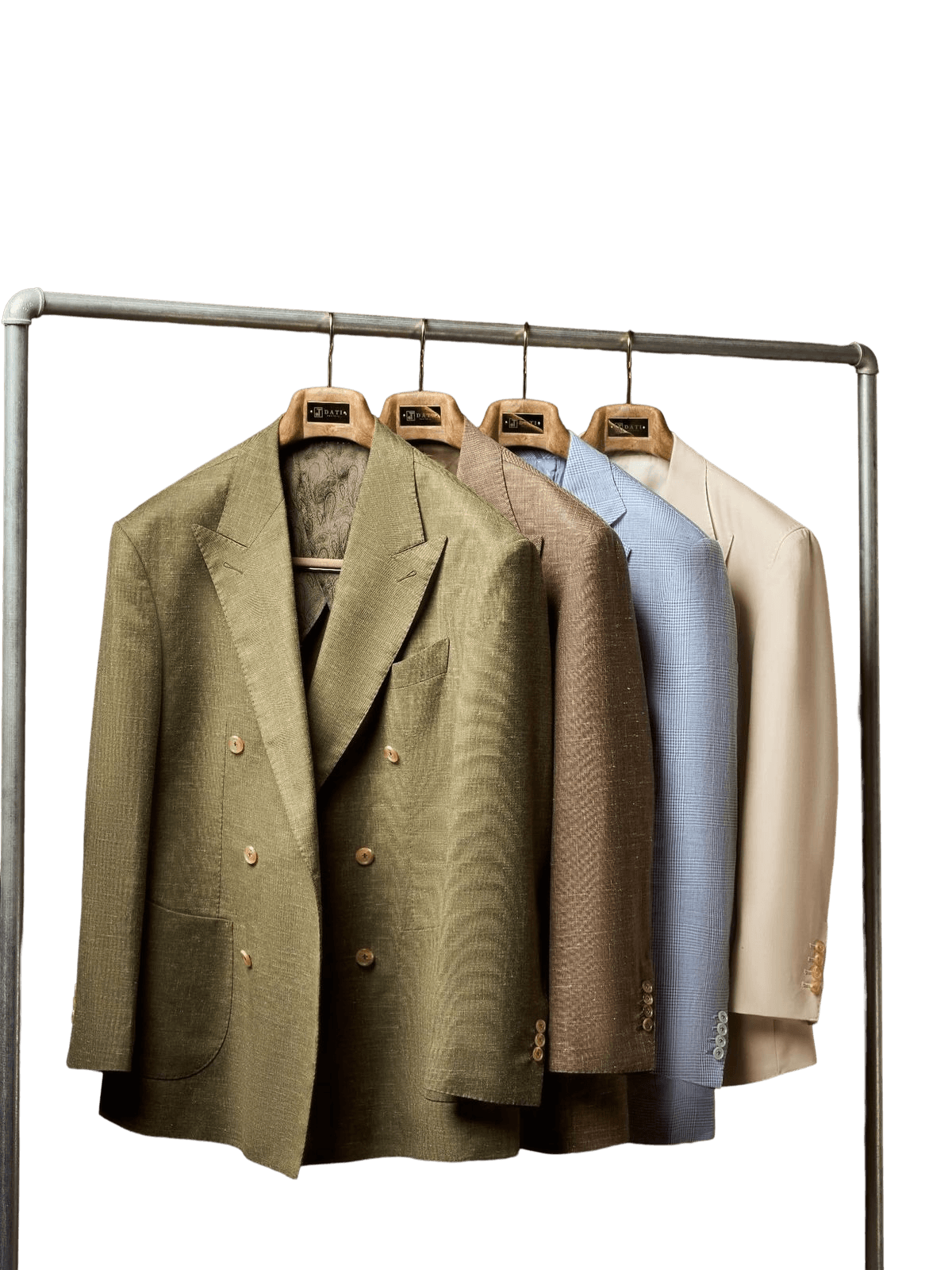Bespoke jackets on hangers in the atelier